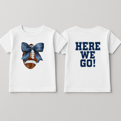 Toddler girls' football tee, front football with blue bow, "HERE WE GO!" on back. Sizes 2T-5T.
