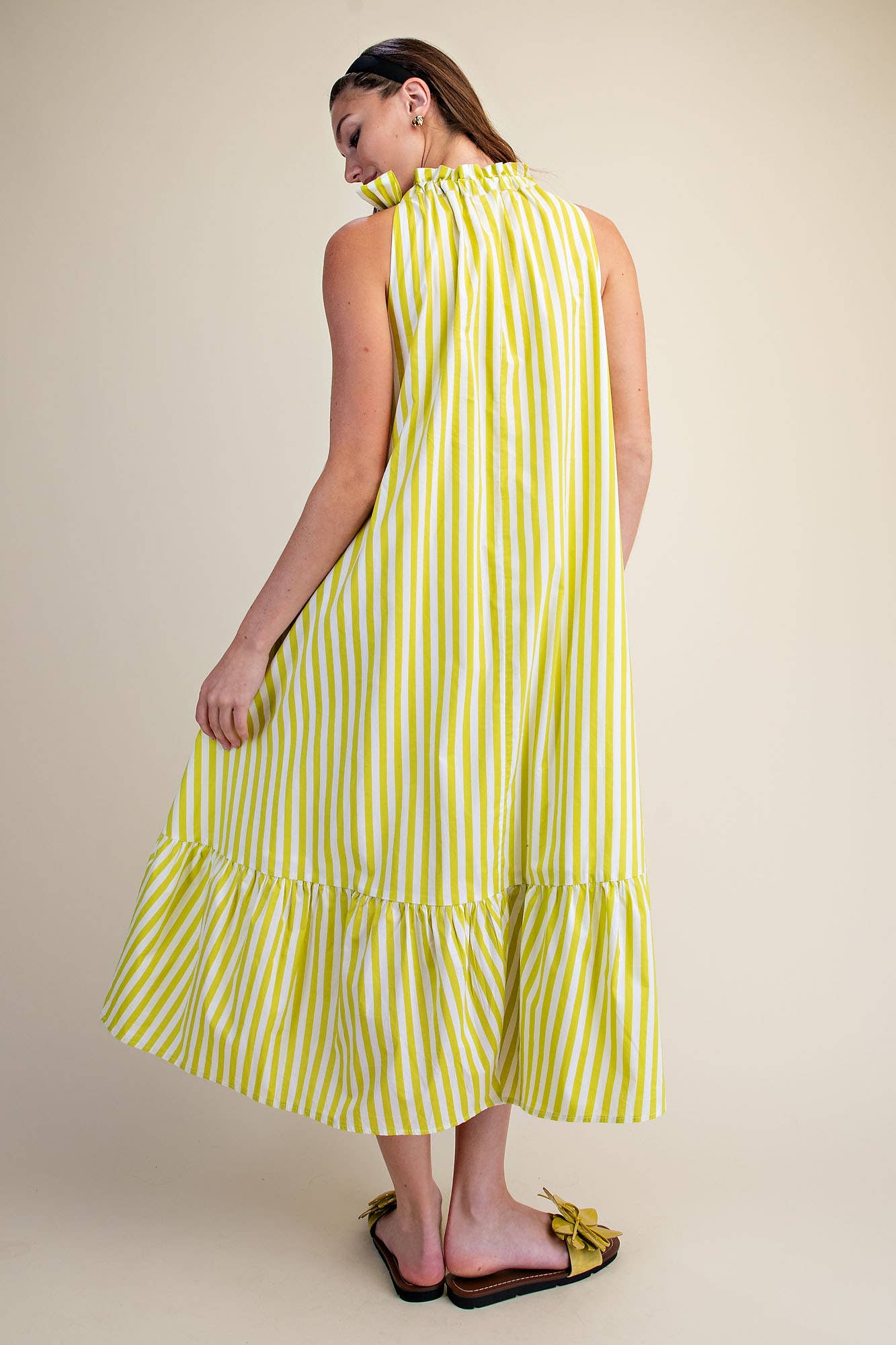 Stripe Midi Dress With Sleeveless Ruffle Neck Tie in Navy, vertical stripes, ruffle neckline. Available sizes: L.