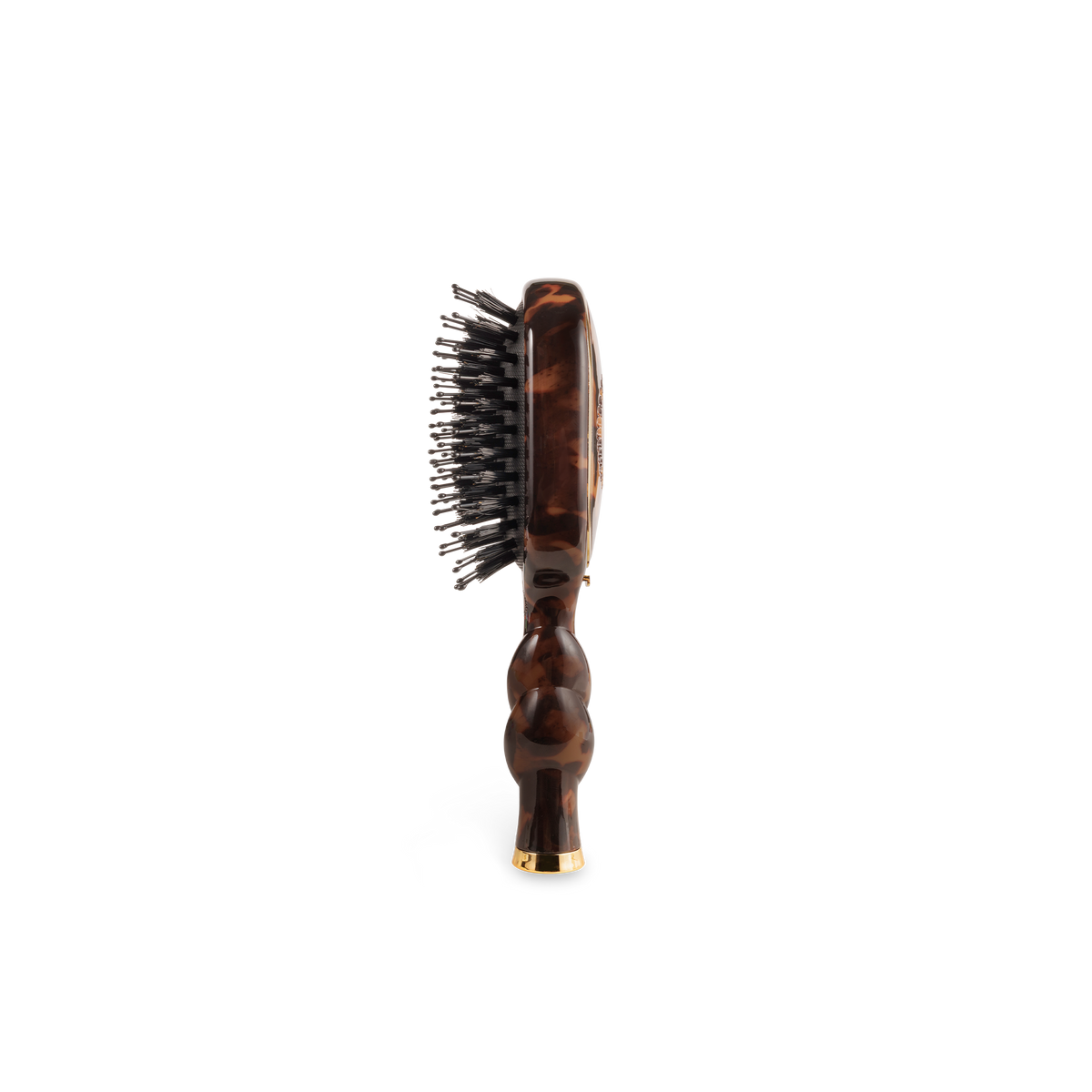 The Mini Boar Brush | Tortoise with a wavy handle and metal bristles. Available in mini size.