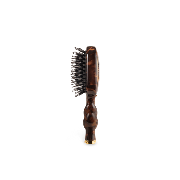 The Mini Boar Brush | Tortoise with a wavy handle and metal bristles. Available in mini size.
