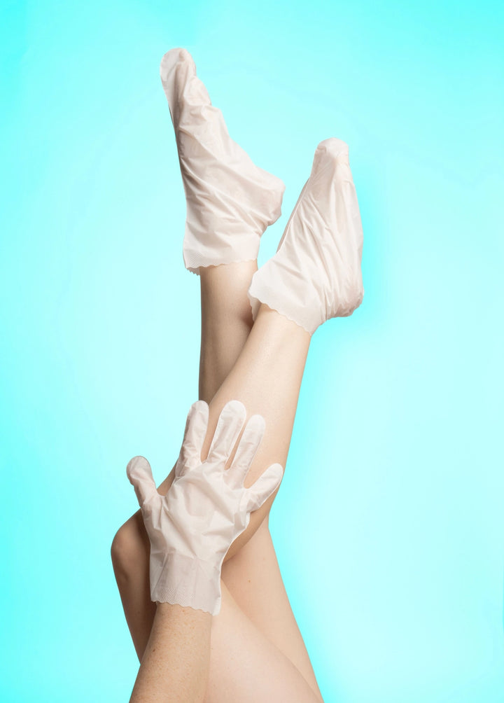 Antioxidant-rich Smooth It Over Hydrating Hand &amp; Foot Masks gloves and plastic moisturizing socks.