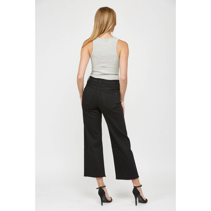 WIDE LEG CROP: BLACK BEAUTY, size 31. Black wide-leg cropped jeans with a raw hem, back pockets, and belt loops.