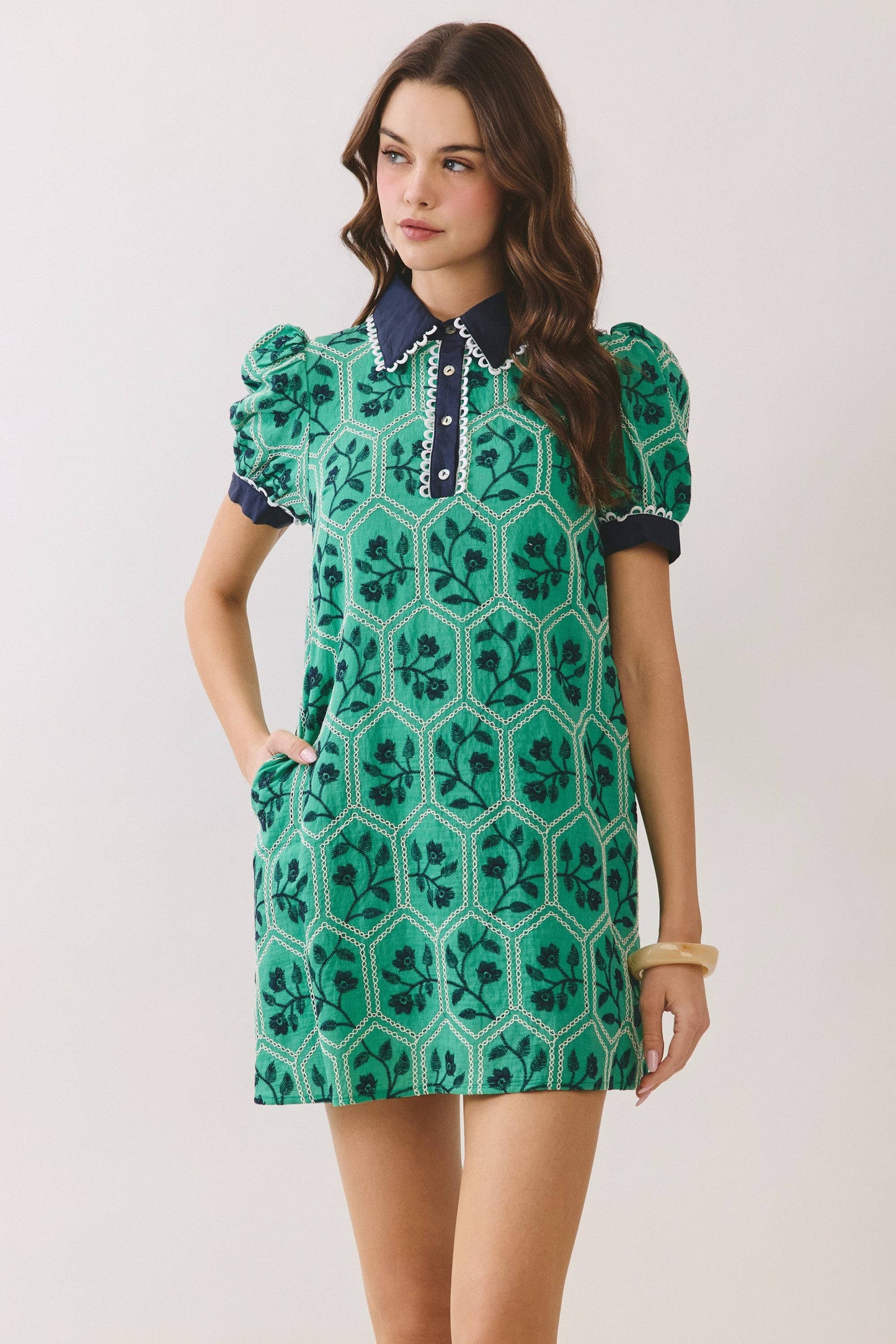 Green Geometric Print Floral Puff Sleeve Dress with dark collar and buttons. Available in sizes XS to XL.