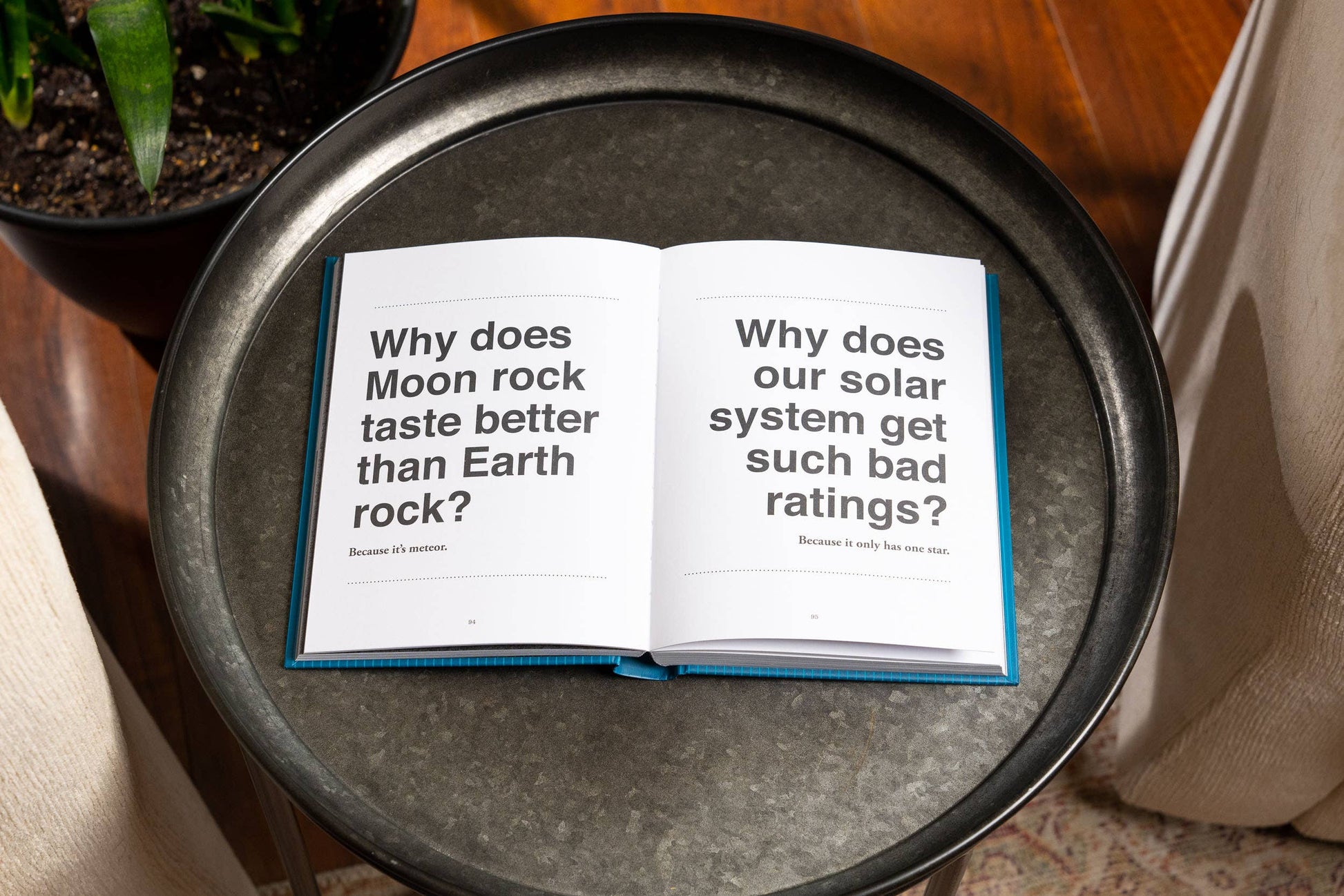World’s Greatest Dad Jokes: The Complete Collection" hardcover book, open. Available in standard hardcover size.