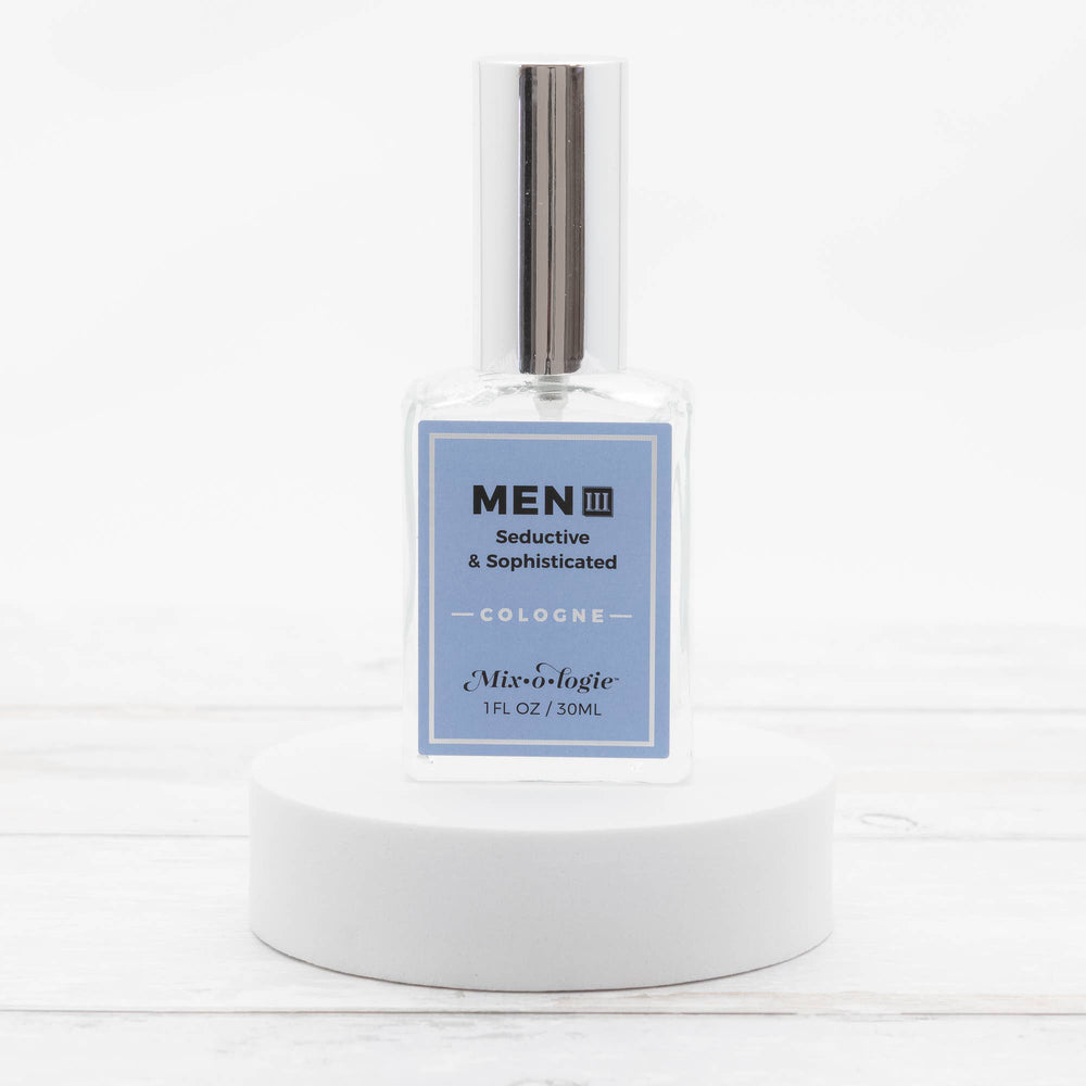 Clear glass bottle of Men’s III Cologne Spray, 30mL, silver cap, "Mix•o•logie" label. Available in 30mL size.