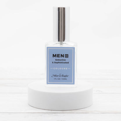 Clear glass bottle of Men’s III Cologne Spray, 30mL, silver cap, "Mix•o•logie" label. Available in 30mL size.