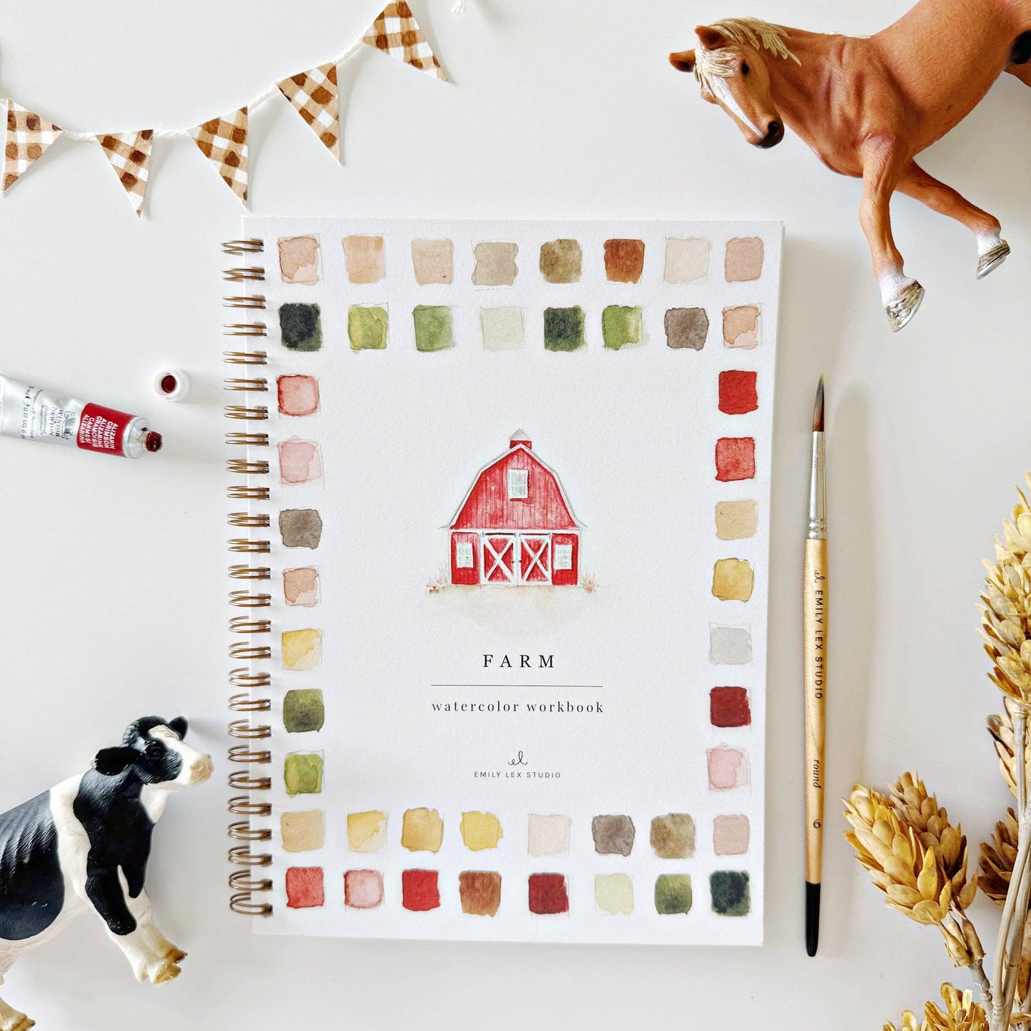 The Farm Watercolor Workbook is a spiral-bound coloring book with a red barn cover. Sizes available: standard.