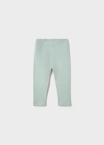 Light green, full-length cotton leggings with elastic waistband. Available in toddler and girl sizes. 2-pack set.