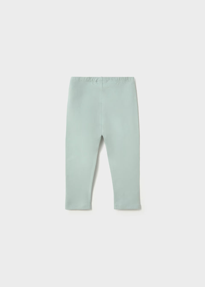 Light green, full-length cotton leggings with elastic waistband. Available in toddler and girl sizes. 2-pack set.