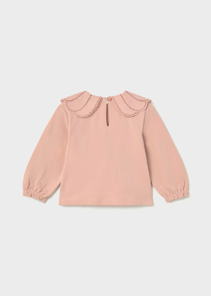 Light pink long-sleeve blouse with double-layered scalloped petal collar, elastic cuffs, and buttoned keyhole back. Available in sizes 2T-6T.