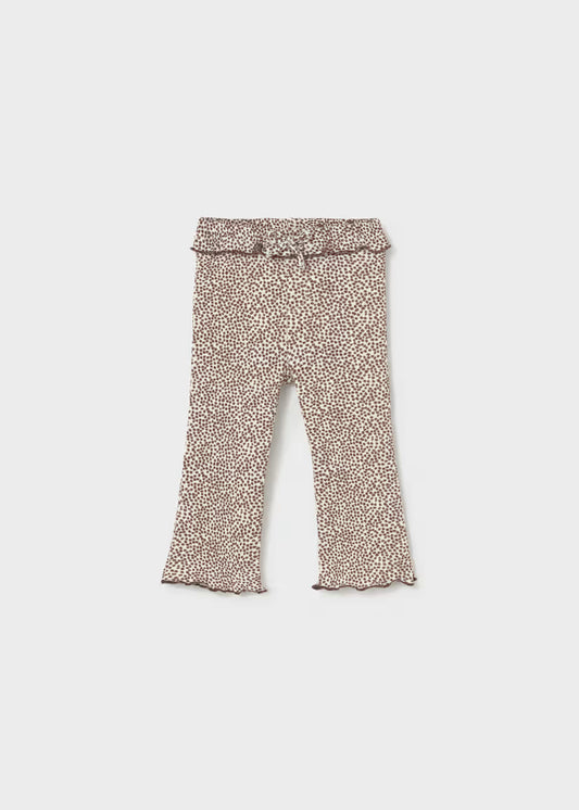 Chocolate dotted ribbed flare leggings for little girls with ruffled waistband and flared hems. Available in sizes 2T-6T.
