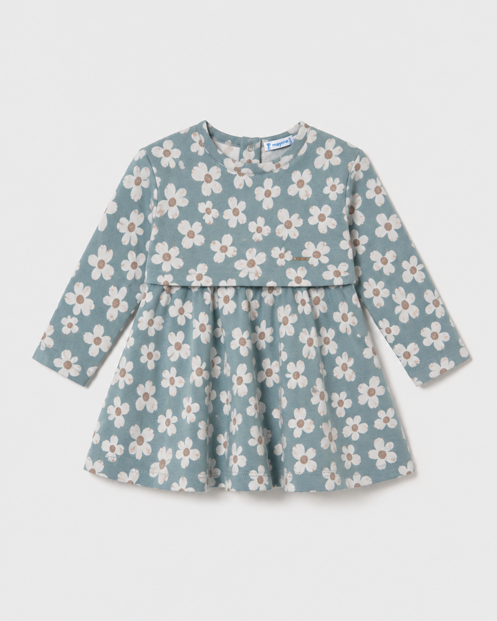 Blue jacquard dress with long sleeves, white daisy floral print, and flared skirt; available in children’s sizes.