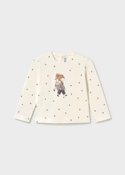 Little Girl Printed Long Sleeve T-Shirt with cream sleeves, brown heart patterns, glitter dot accents, and a central illustrated motif; available in sizes 2T-6.