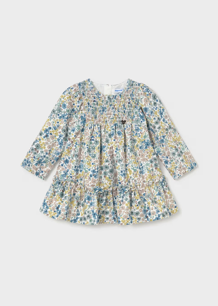 Baby Girl Floral Printed Velvet Dress with long sleeves, multicolored floral print, gathered bodice, ruffled skirt, round neckline, velvety soft fabric. Available in sizes 0-3M to 24M.