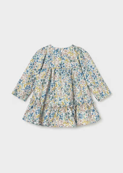 Baby Girl Floral Printed Velvet Dress with long sleeves, round neckline, ruffled flared skirt, and blue, green, and yellow floral pattern; available in sizes 0-24 months.