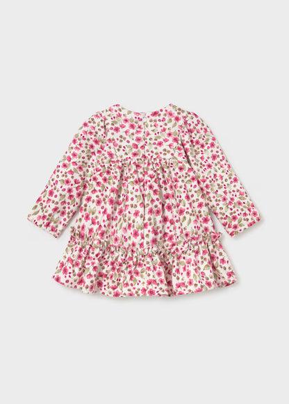 Velvet baby girl dress with long sleeves, pink floral print, ruffled hem, and gathered waist. Available in sizes 0-3M to 24M.