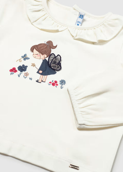 White long-sleeve baby shirt with ruffled Peter Pan collar, fairy print, and 3D sewn-on wings. Available in sizes 0-24 months.