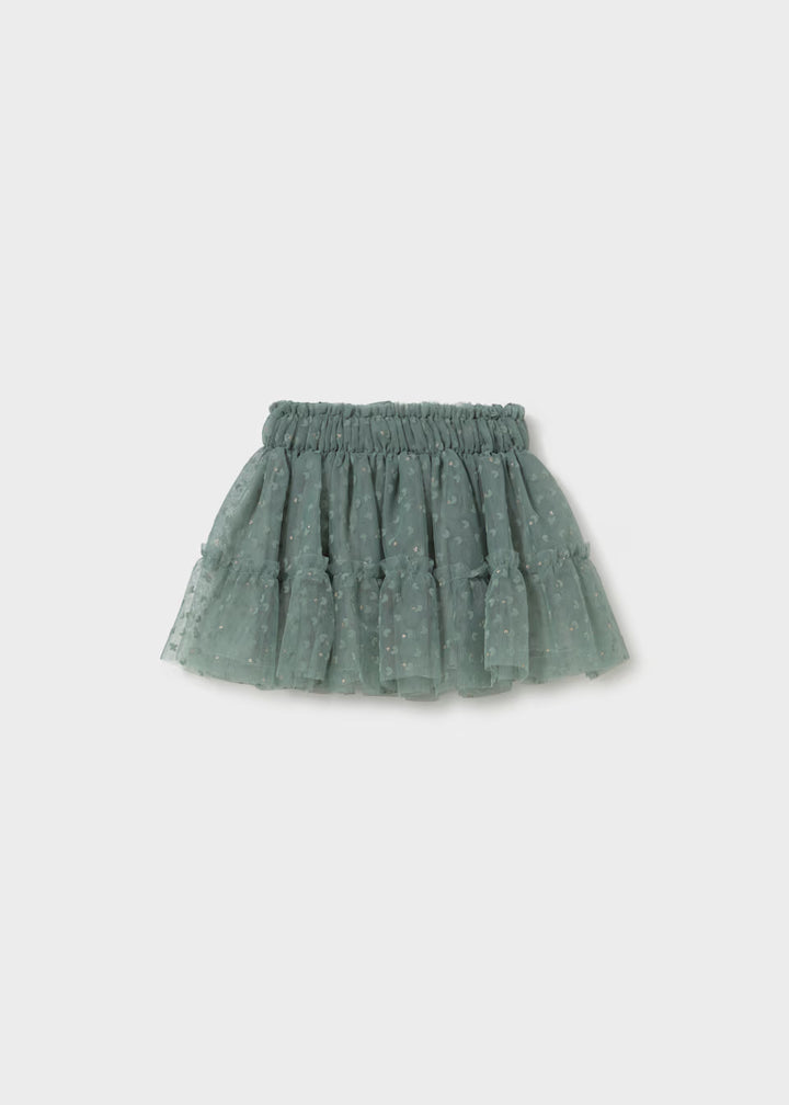 Laurel Green Baby Tulle Skirt with ruffled tulle, small white polka dots, and elastic waistband. Available in sizes 0-3M, 3-6M, 6-12M, and 12-18M.