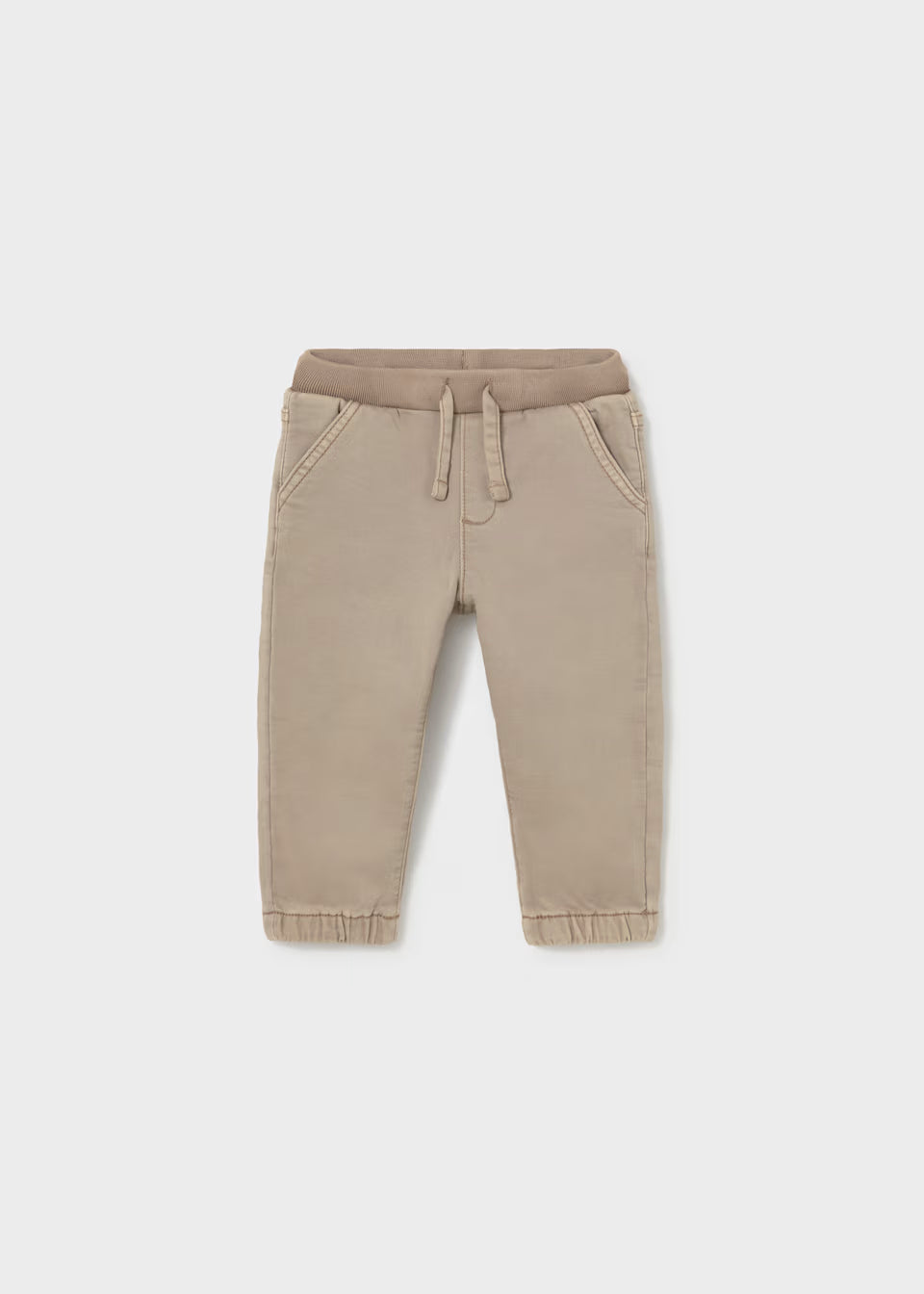 Beige twill jogger pants for toddlers with elastic waistband, drawstring, side pockets, and elastic cuffs. Available in sizes 2T-5T.