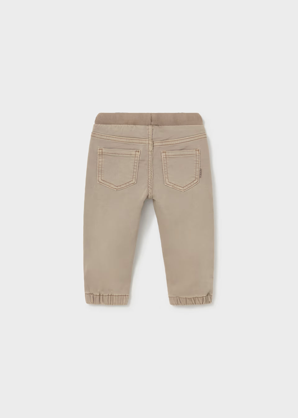Beige twill jogger pants with elastic waistband and cuffs, easy pull-on style, and two stitched back pockets. Available in sizes 2T-5T.