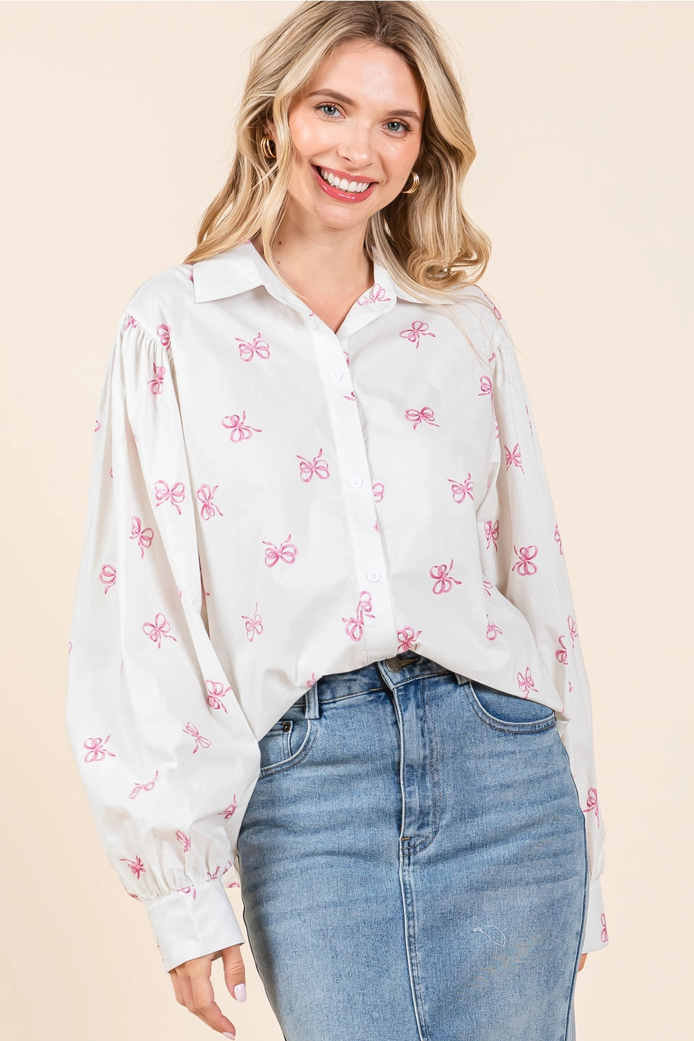 The Ribbon Bow Print Button-Up Blouse features pink butterfly designs. Available sizes: S, M, L, XL.