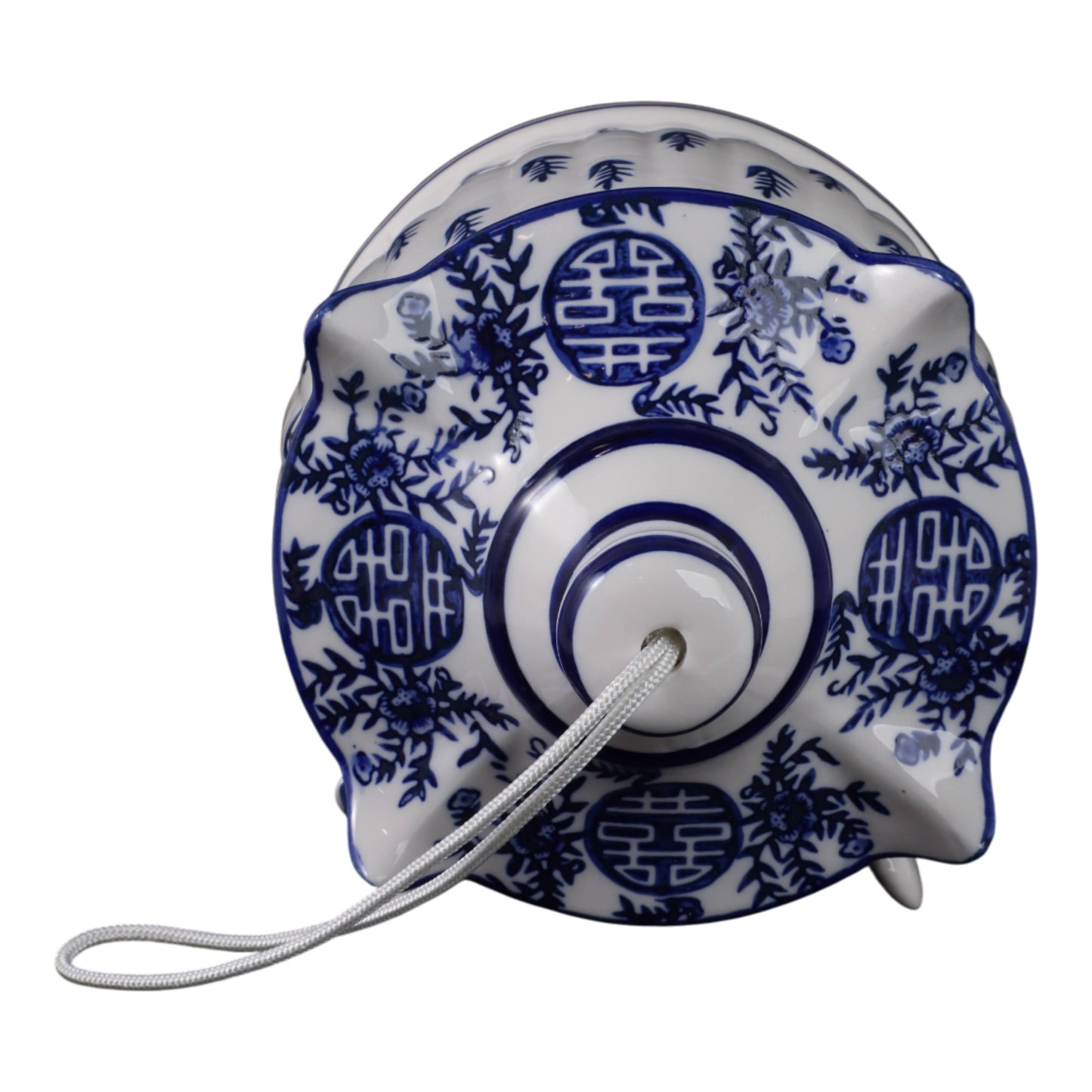 White/Blue Chinoiserie Pagoda Birdhouse, 8 in., with floral and circular patterns. Only available in 8-inch size.