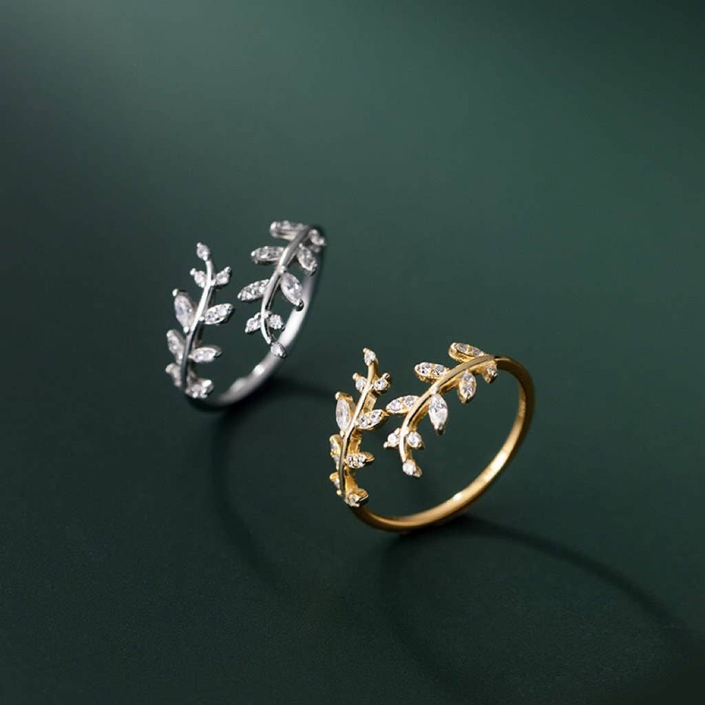 Gold Olive Tree Leaf Branch Band Ring in 925 sterling silver with small clear gemstones, available in sizes 5-9.