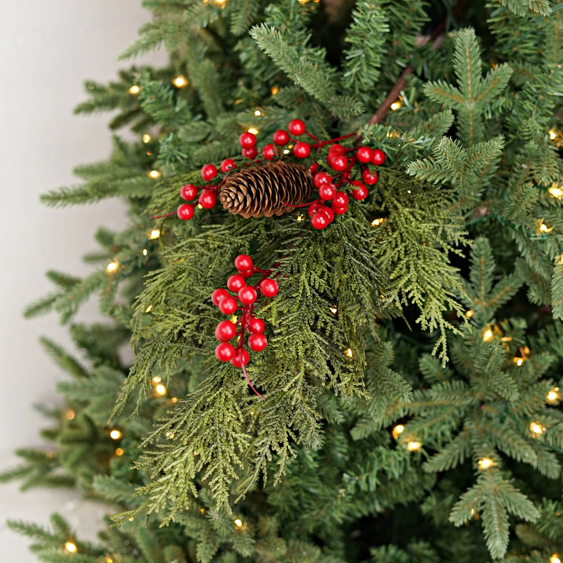 29in Superior Real Touch Mix Cedar Branch with Red Berries; available in 29 inches.