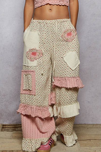 Textured Twill Contrast Ruffle Printed Woven Wide Pants: relaxed-fit, high-waist, floral/solid patches. Sizes XS-XL.