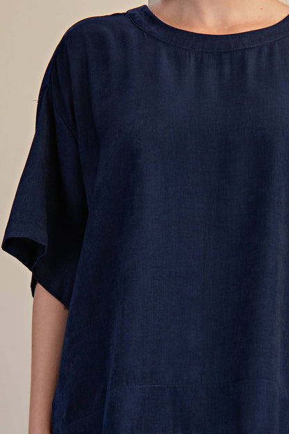 Navy Round Neck Band Oversize Shirt with short sleeves and relaxed neckline. Available in sizes S-XL.