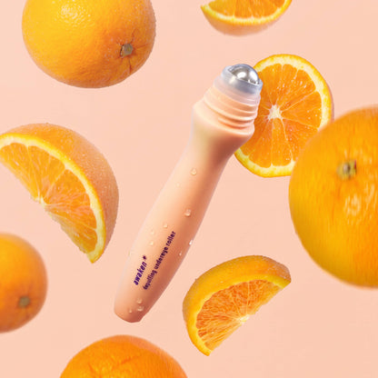 Depuffing Under Eye Roller with Caffeine & Vitamin C features a peach-colored applicator. Available in 15ml and 30ml sizes.