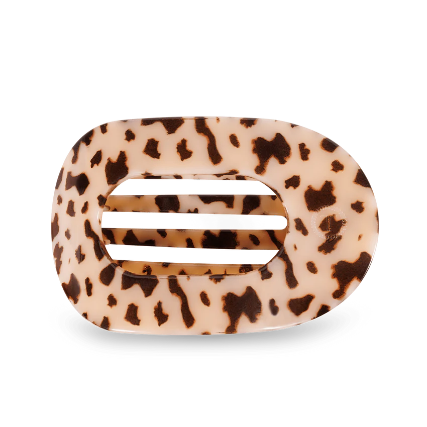 The TELETIES Flat Round Hair Clip features a large oval shape with a tortoiseshell leopard print on a black background. Available size: Large.