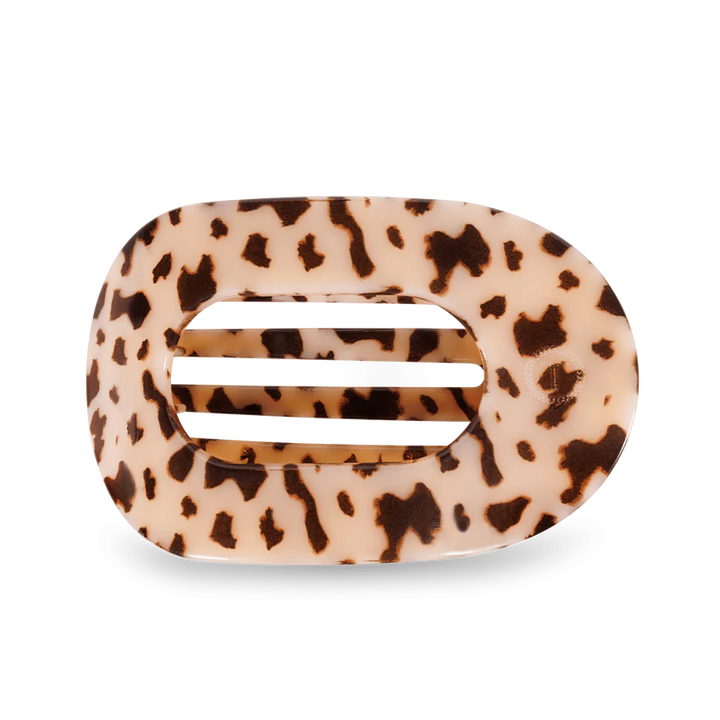 The TELETIES Flat Round Hair Clip features a large oval shape with a tortoiseshell leopard print on a black background. Available size: Large.