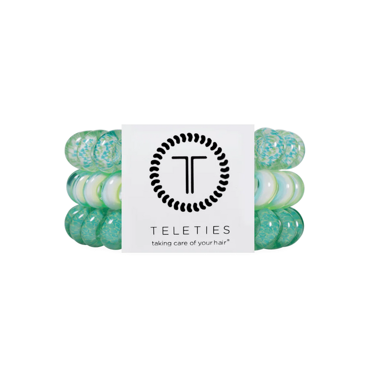 Three green and blue TELETIES Hair Ties with logo card. Available in small, medium, and large sizes.