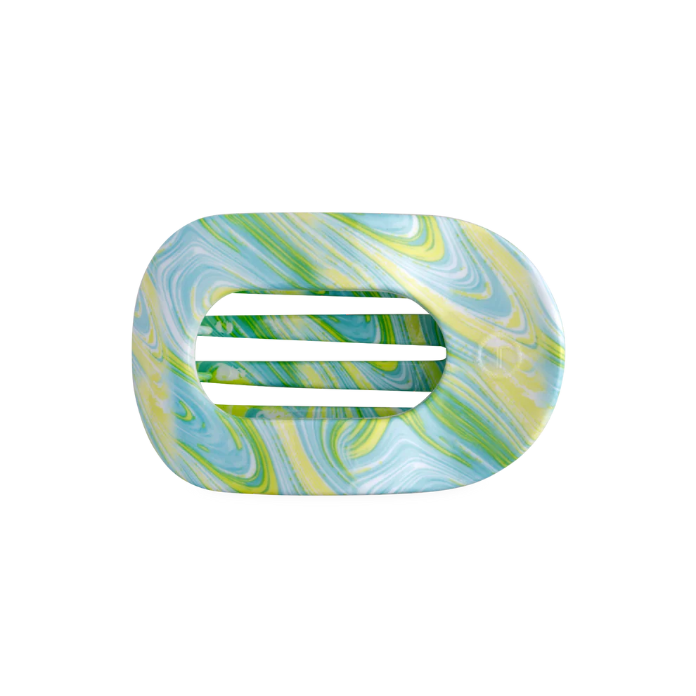 Flat round hair clip with green, yellow, white, and blue marbled tie dye pattern. Available in small and large sizes.