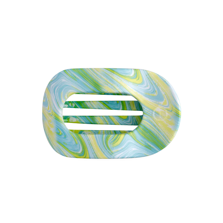 Flat round hair clip with green, yellow, white, and blue marbled tie dye pattern. Available in small and large sizes.