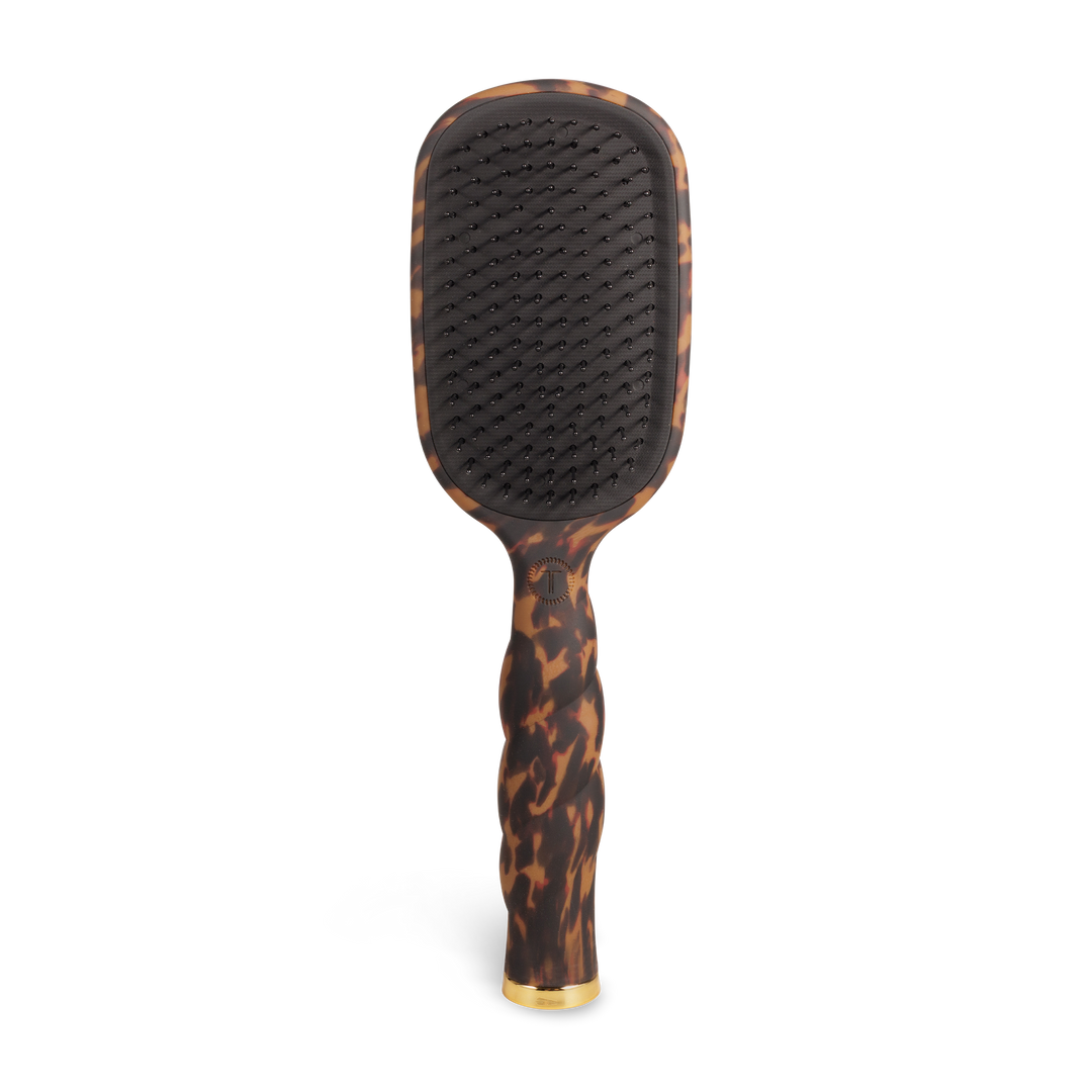 Rectangular detangler hair brush for thick hair with tortoiseshell-patterned handle, gold-accented tip, and black bristles. Available in multiple sizes.