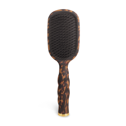 Rectangular detangler hair brush for thick hair with tortoiseshell-patterned handle, gold-accented tip, and black bristles. Available in multiple sizes.