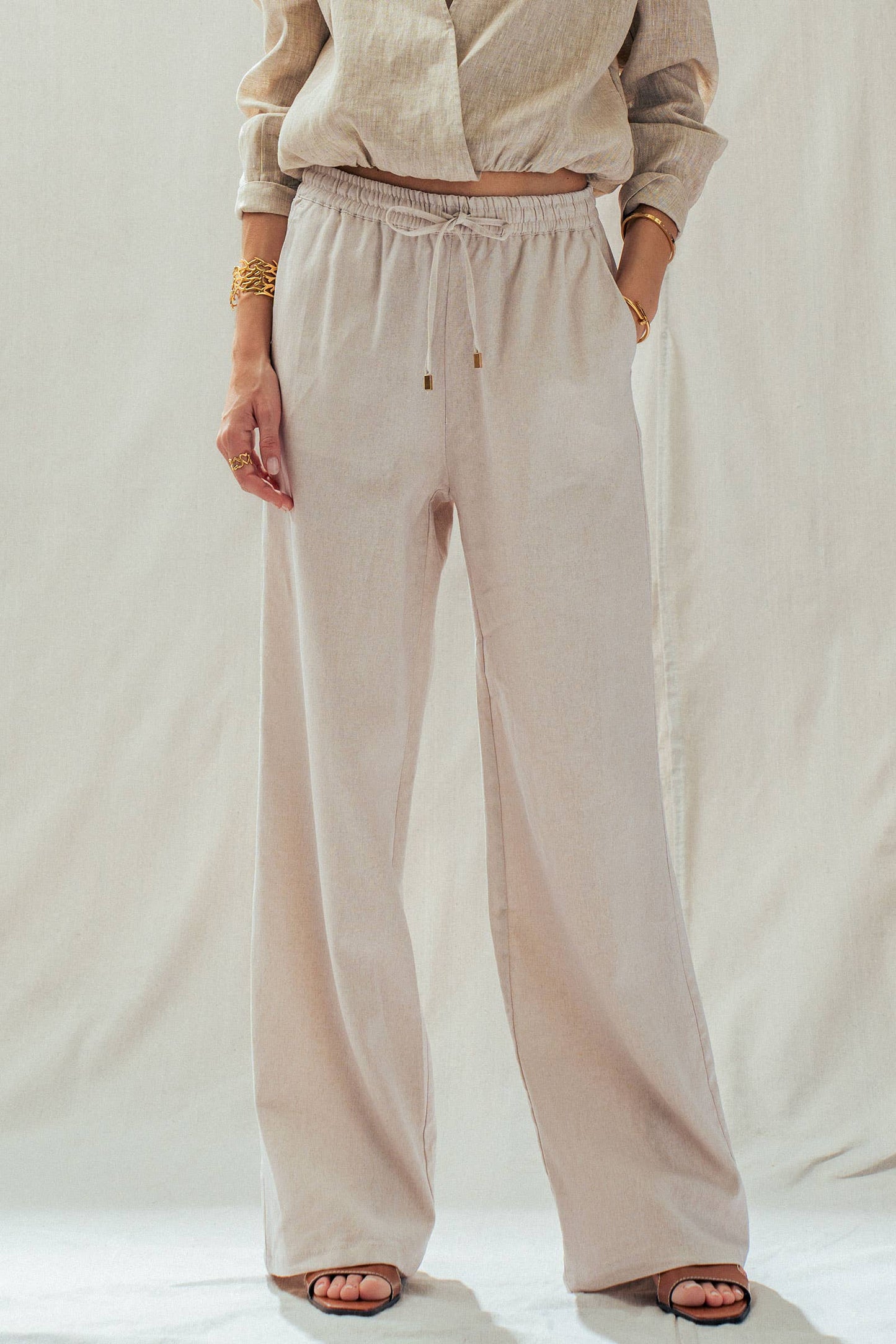 Natural Linen Blend Wide Leg Drawstring Pants, available in sizes XS-XL. Matching long-sleeve top sold separately.