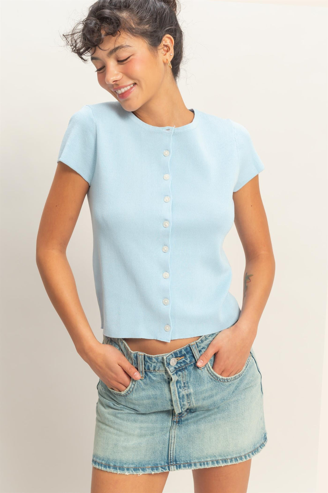 Button Front Short Sleeve Knit Top in light blue, available in sizes XS-XL.