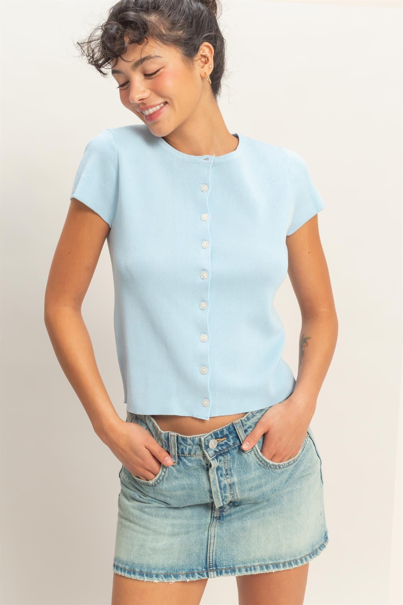 Button Front Short Sleeve Knit Top in light blue, available in sizes XS-XL.