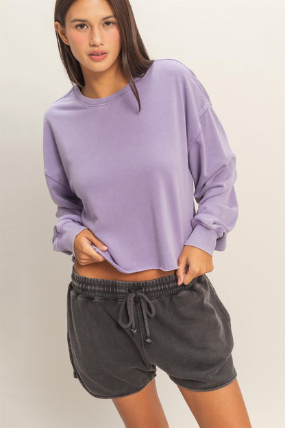 Lavender Cropped Mineral Wash Sweatshirt, available in sizes XS-XL. Features cropped fit and washed finish.