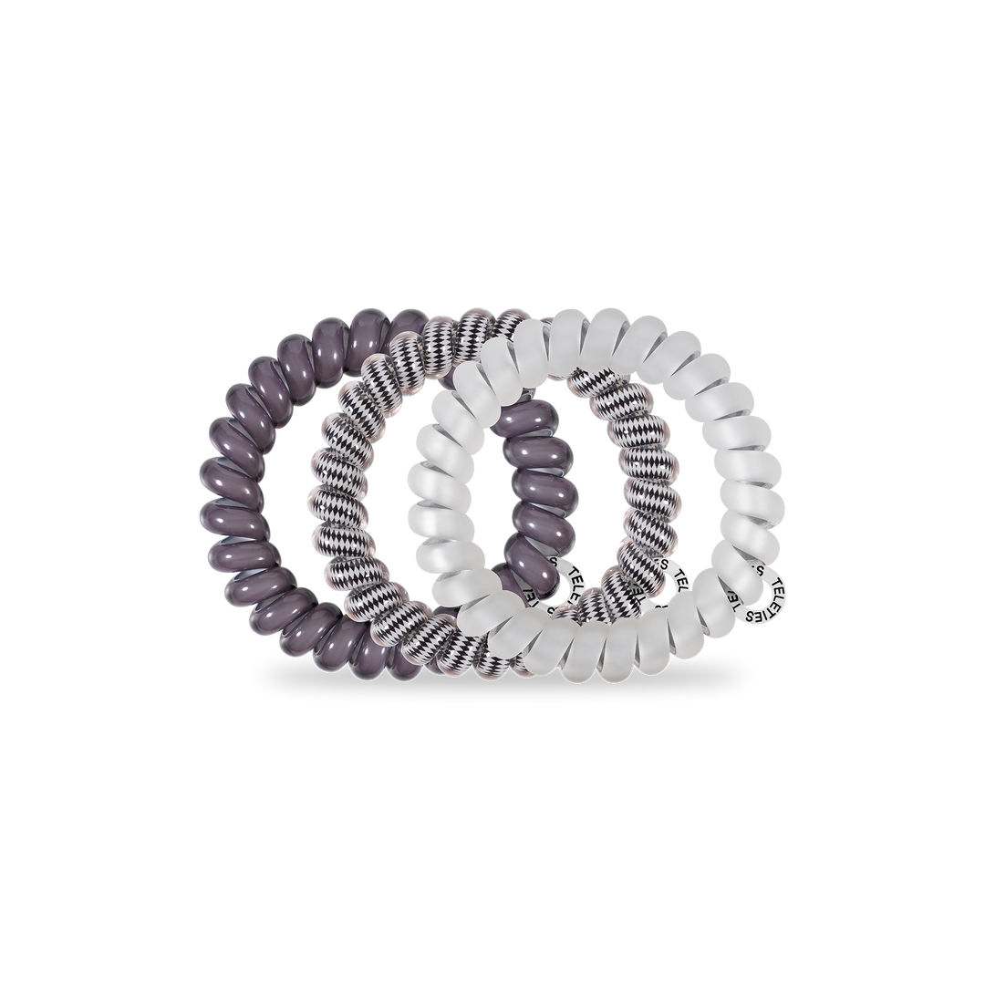 Large Three Spiral Hair Coils: solid dark purple, white with black stripes, translucent white; strong grip; metallic tag.