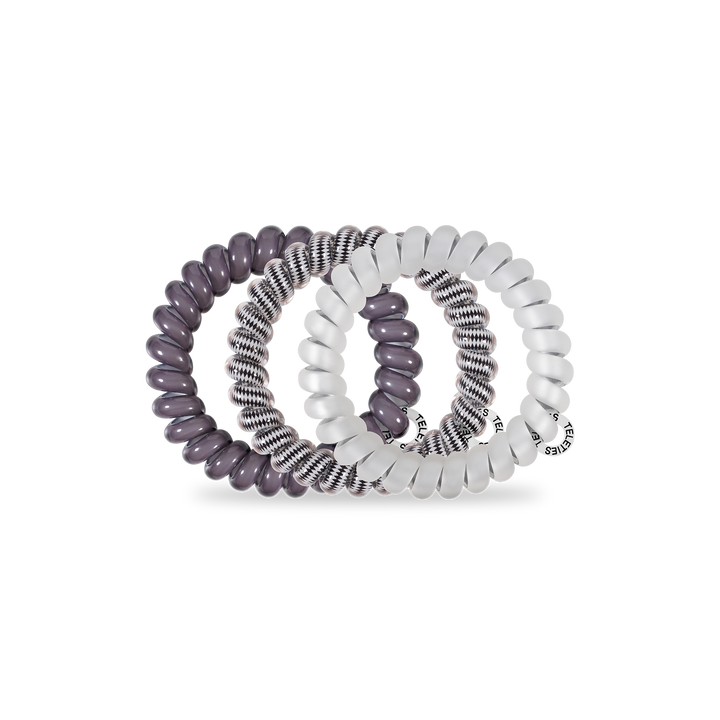 Large Three Spiral Hair Coils: solid dark purple, white with black stripes, translucent white; strong grip; metallic tag.