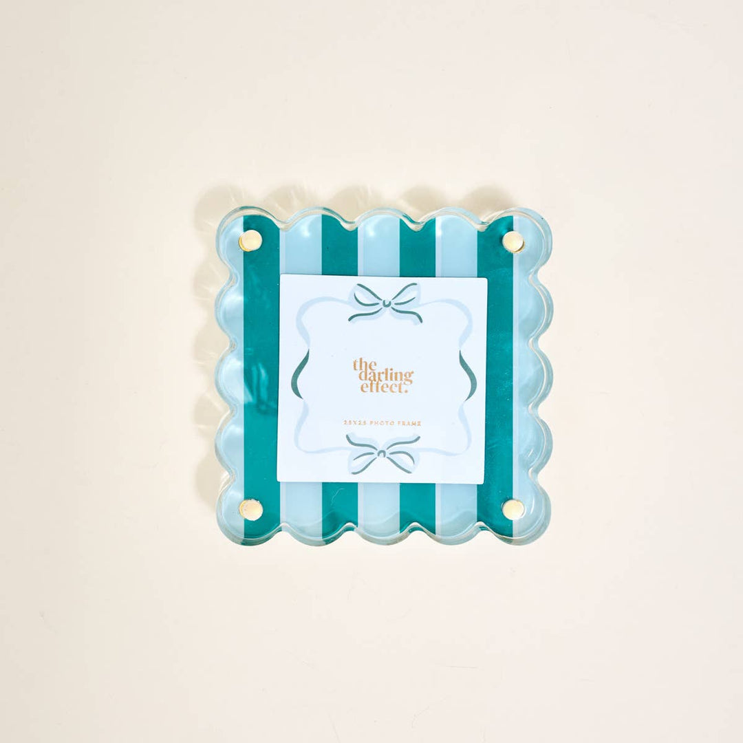 Square, scalloped-edge acrylic frame with light blue and teal stripes, gold corners, bow card. Sizes: 4x4", 5x5".