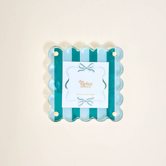 Square, scalloped-edge acrylic frame with light blue and teal stripes, gold corners, bow card. Sizes: 4x4", 5x5".