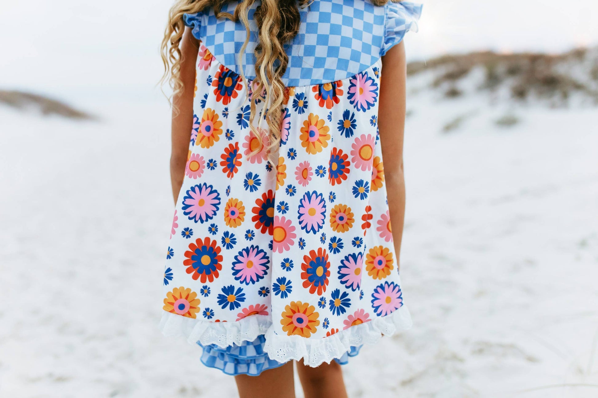 Girls Blue Check Flower Power Short Set: pink, orange, blue retro florals with blue check shoulders. Sizes: 2T–10Y.