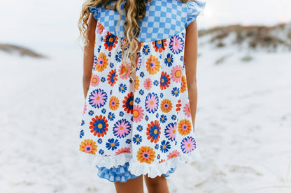 Girls Blue Check Flower Power Short Set: pink, orange, blue retro florals with blue check shoulders. Sizes: 2T–10Y.