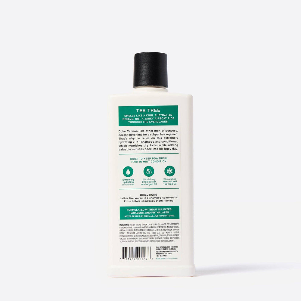 White bottle with black cap, green and white label, 2-in-1 Tea Tree Shampoo + Conditioner. Available in 12oz and 24oz.