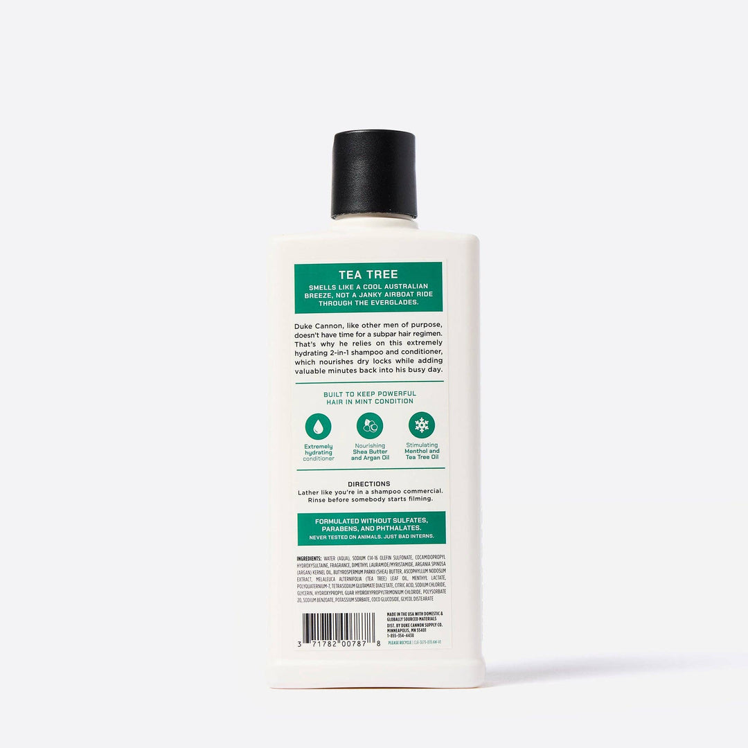 White bottle with black cap, green and white label, 2-in-1 Tea Tree Shampoo + Conditioner. Available in 12oz and 24oz.